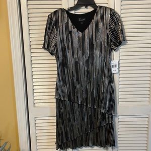 Brand new Black and gold/silver shiny party dress with layered ruffles